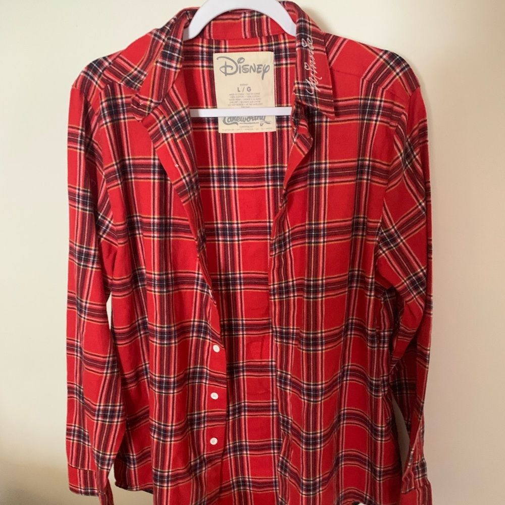 Disney flannel with a logo on the back
